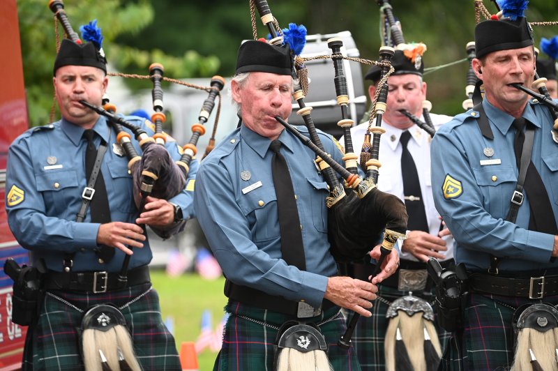 Pipe Major Robert Galloway plays the bagpipe with the Delaware State Police Pipes and Drums.