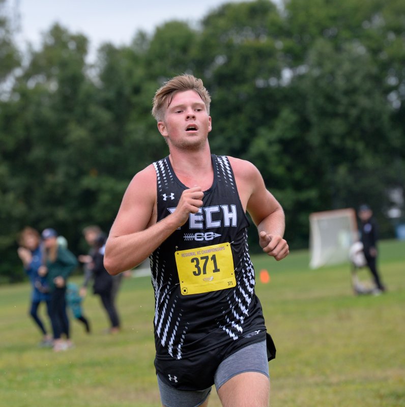 Bennett Brumbley of Sussex Tech leads his team with a time of 18:37.