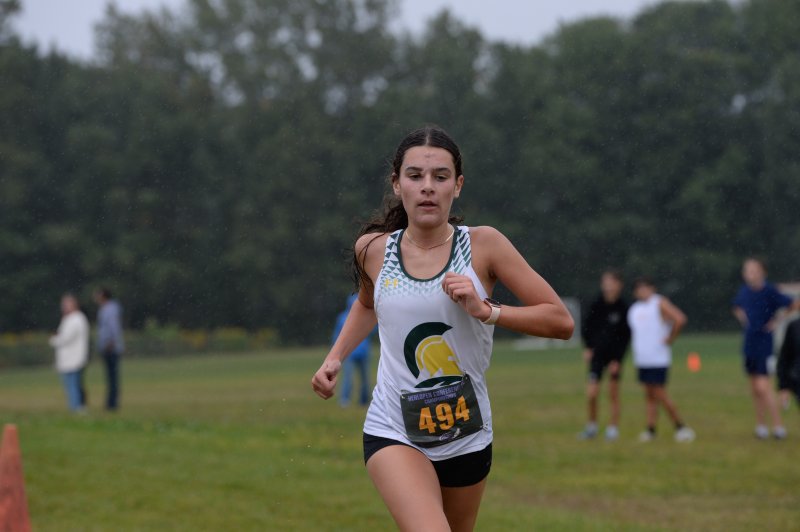 Sadie Trumbill of Saint Mark’s kicks to a time of 20:28.