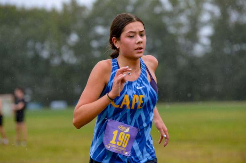 Claudia Stazzone of Cape heads home with a time of 20:53.