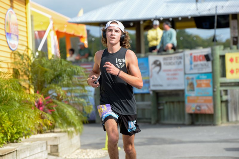 Austin Guerrieri wins the Stop, Drop & Run 5K in 19:45.
