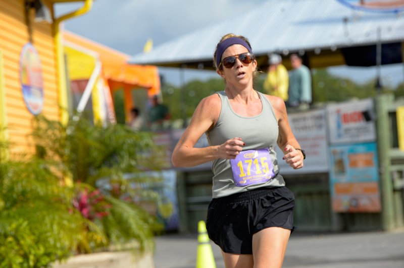 Melissa Wiley wins the Stop, Drop & Run 5K women’s race in 20:31.