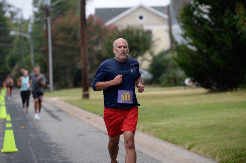 Gavin Radka heads home with a time of 25:55 at the Cannonball 5K.