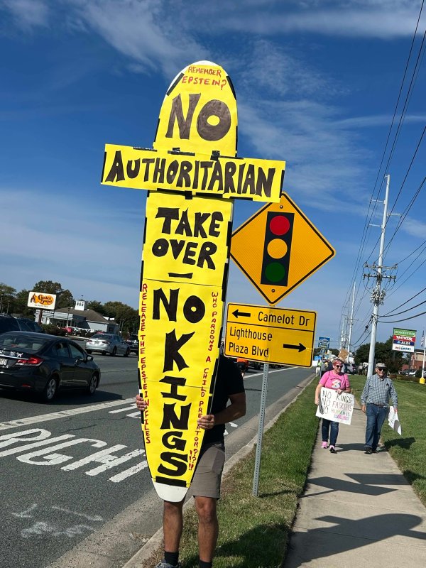 Many people brought homemade signs to the peaceful protest outside Rehoboth Beach. BOB DUNBAR PHOTO