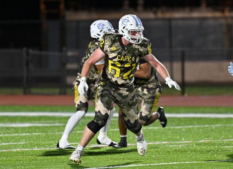 Liam Ramsey gets out in front to lead block.