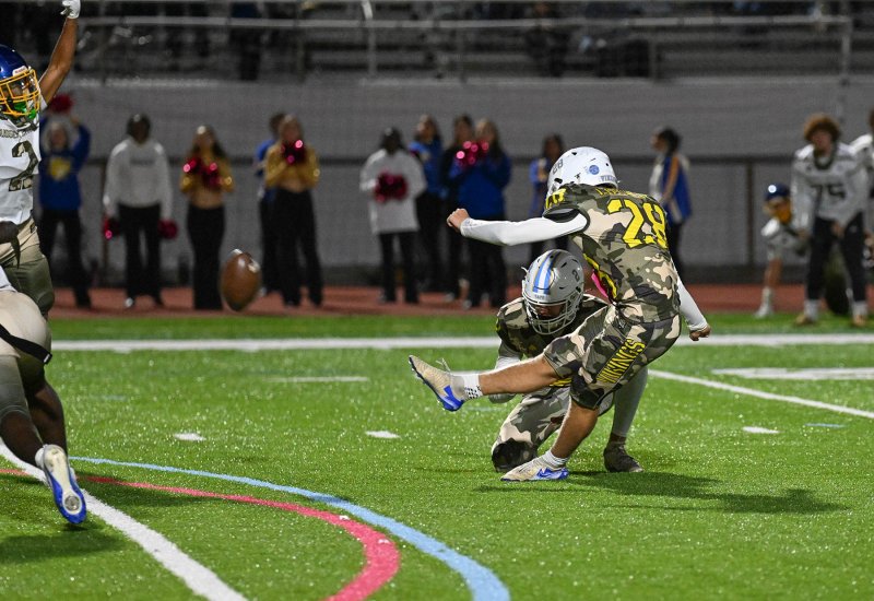 Austin Tyndall boots a 30-yard field goal to lift the Vikings to a 23-21 victory over Sussex Central. DAN COOK PHOTOS