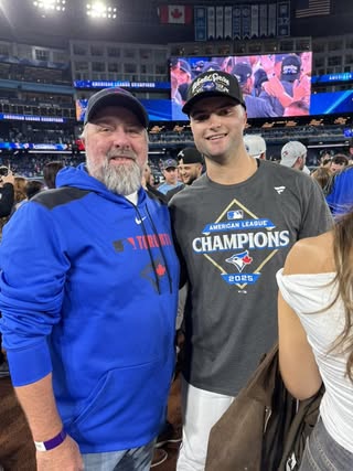 Mason Fluharty is shown with his dad Lynn celebrating a trip to the World Series following a win over the Seattle Mariners in Game 7 of the American League Championship Series. SOURCE: CAPE HENLOPEN HIGH SCHOOL ATHLETICS