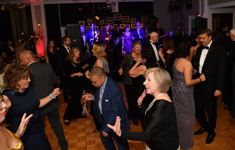 Guests at the 2024 Harry K Foundation Christmas Gala get down to the music of The Funsters. DAN COOK PHOTO