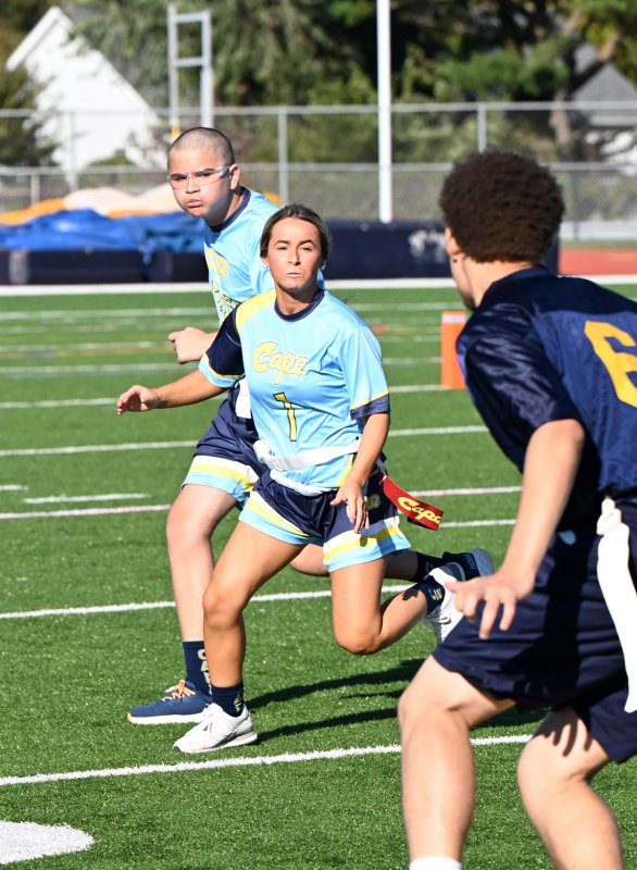 Julian Puente and Carmen Williams chase down Seaford’s Timothy White.
