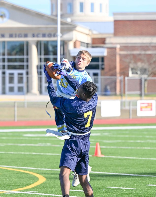 Cape’s Jaxson Holgerson and Seaford’s De’Von Cannon-DeShields battle for possession of a pass.