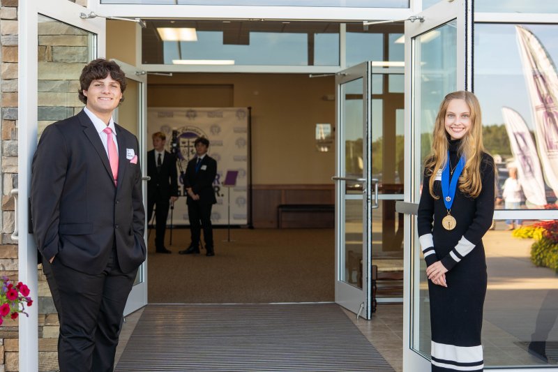 Greeting guests at Delmarva Christian's Funding the Future Banquet are Eric Murray, left, and Claire Balliet. SUBMITTED PHOTOS