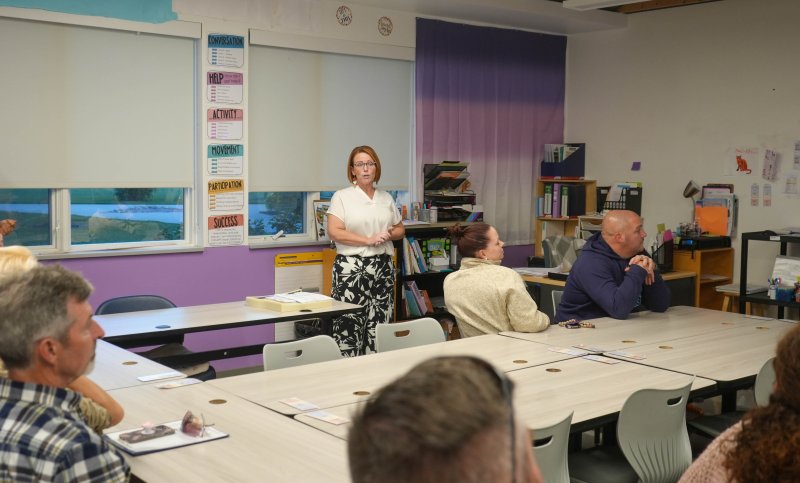 Rachael Coffelt, a fifth-grade teacher at Sussex Academy, speaks to parents at the elementary back-to-school night.
