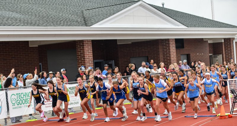 The start of the five-team middle school cross country race.
