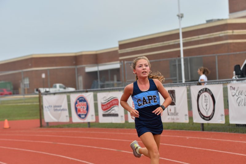 Mildred Alleman of Fred Thomas keeps pace.