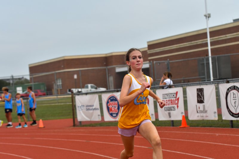 Kinley Johnson of Mariner heads to the finish line.