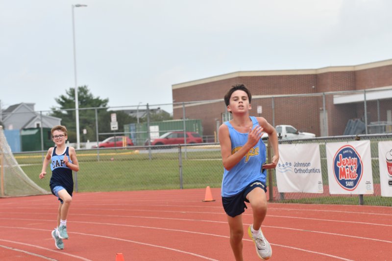 Daxton Napolitano of Beacon tries to stay ahead of Joseph Jordan of Fred Thomas.
