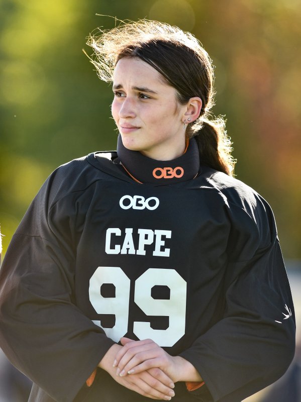 Goalie Izzy Mekulski looks placid and reflective.