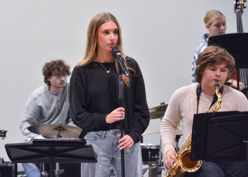 Daphnis Mock prepares for her solo performance with the jazz ensemble.