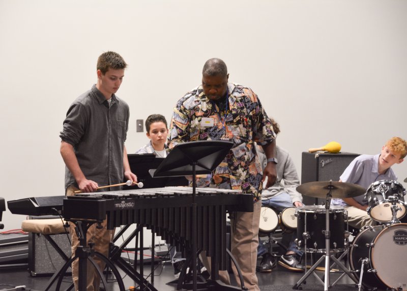 Wycliffe Gordon shares some pointers with Will Runde for his part of the performance.