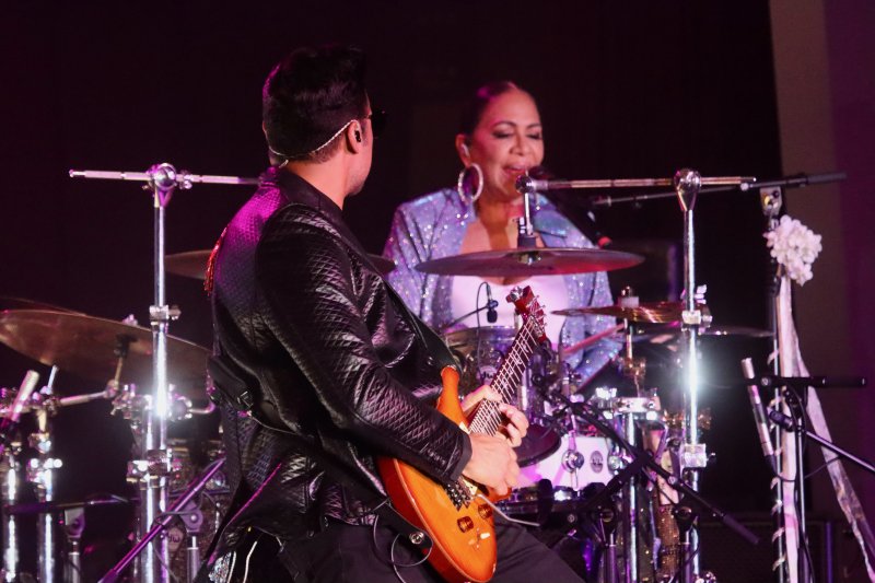 Sheila E., right, said her band is her family. The guitar player on the left is Mychael Gabriel, who is her godson and the godson of the late musician, Prince.