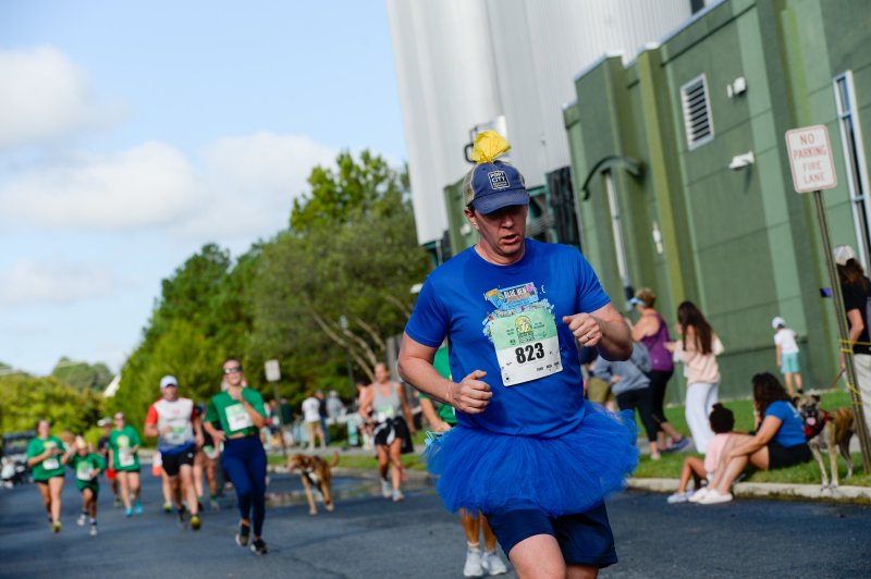 Bill Ostrum is all dressed up and records a time of 31:21.