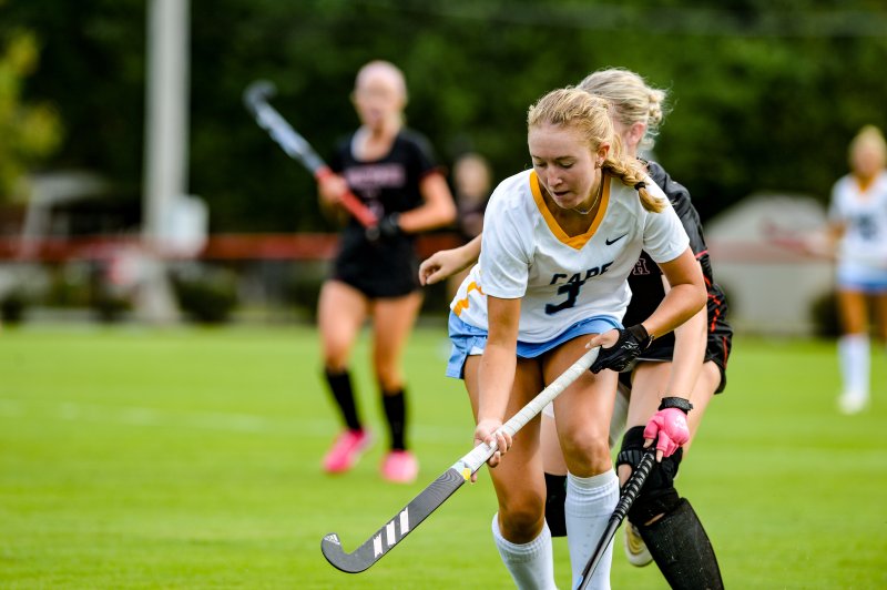 Mairead Rishko pushes the ball up the field.