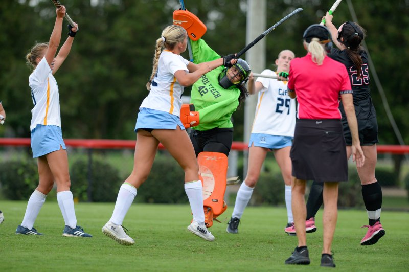 A high ball is knocked home by Ellen Ramsey.