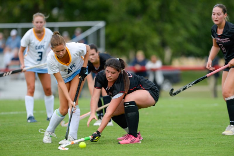 Alysa McCarthy drives past a Poly defender.