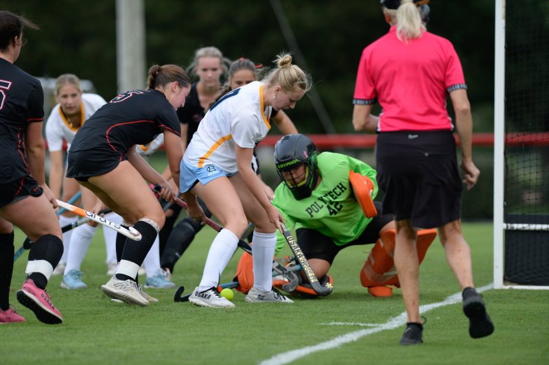 Grace Heers looks for loose change.