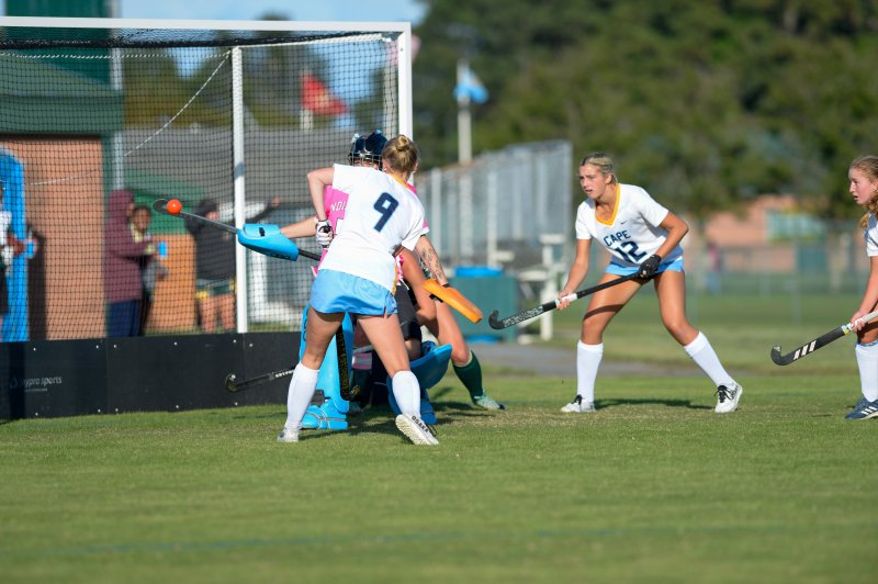 Mairead Rishko, far right, lifts the ball past the goalie and into the cage.