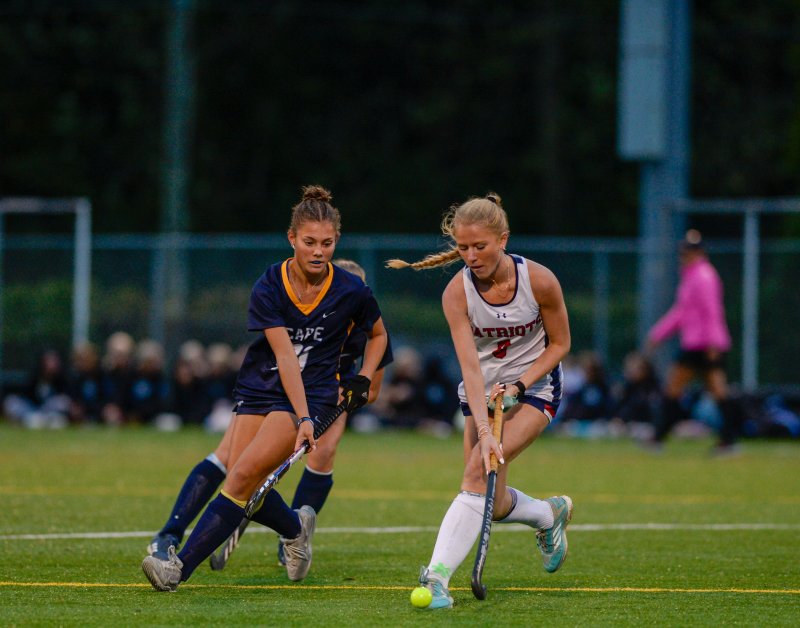 Newark Charter’s Genevieve Walch battles Kailey McMahon.