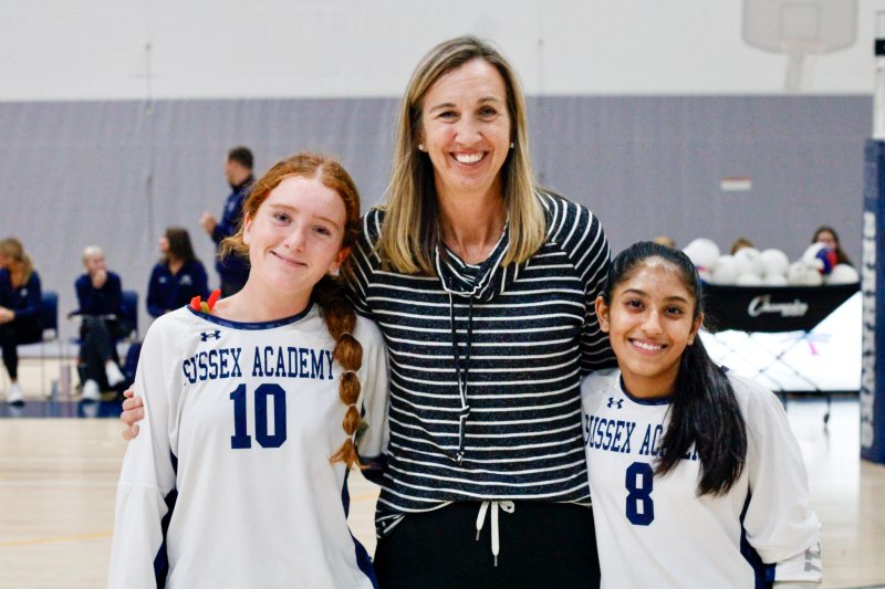 Sussex Academy sophomores Jopie Smith, left, and Eva Patel walk with Stephanie Sherman. AARON R. MUSHRUSH PHOTOS