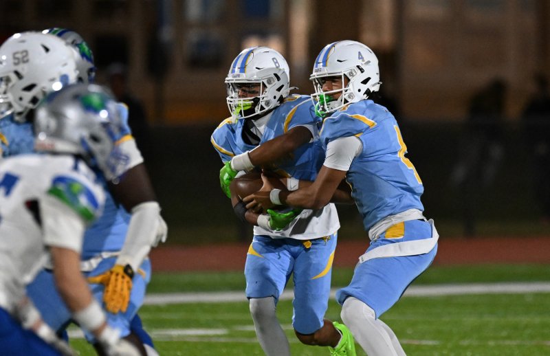 Jameson Tingle hands off to Ty Handy who runs for a touchdown.