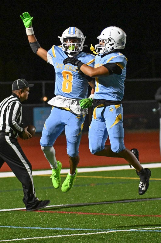 Cape senior Ty Handy celebrates his touchdown with teammate Lamar McCoy.
