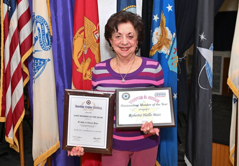 Auxiliary Unit 28 member Roberta Halle Bass is presented with the 2025 Unit Member of the Year plaque and the 2025 State of Delaware Outstanding Member of the Year.