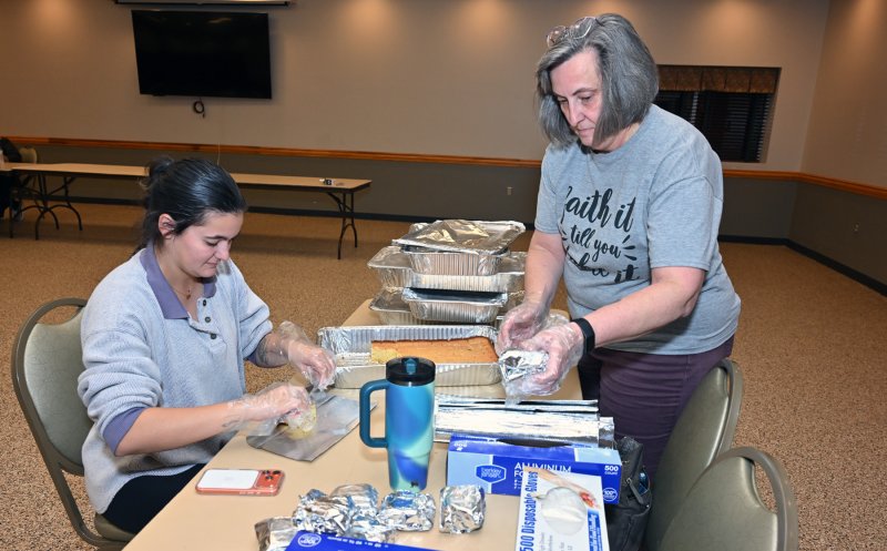 The cornbread queens of the volunteer group are Nicole, left, and Jeanne DiAmico.