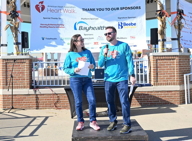 Southern Delaware Heart Walk co-chairs Ben and Sarah Collins speak to the crowd gathered for the event.