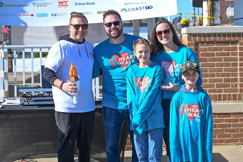 The torch for the Southern Delaware Heart Walk has been passed to a new chair. Shown are (l-r) new Chair Drew DiFonzo, and former co-chairs Ben and Sarah Collins, and their children Elliott and Crosby.