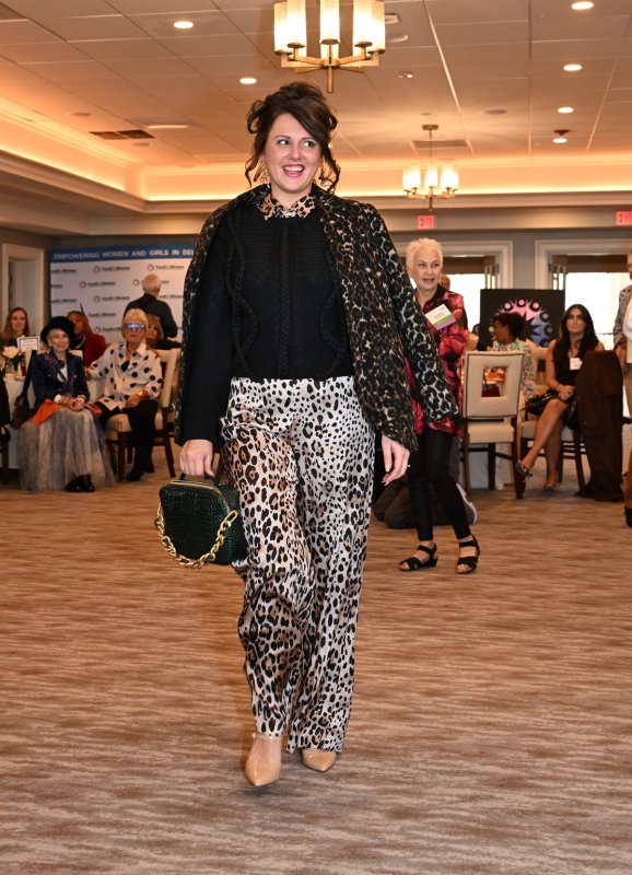 Courtney Jarusinski wears an animal print outfit from Coral Cove.