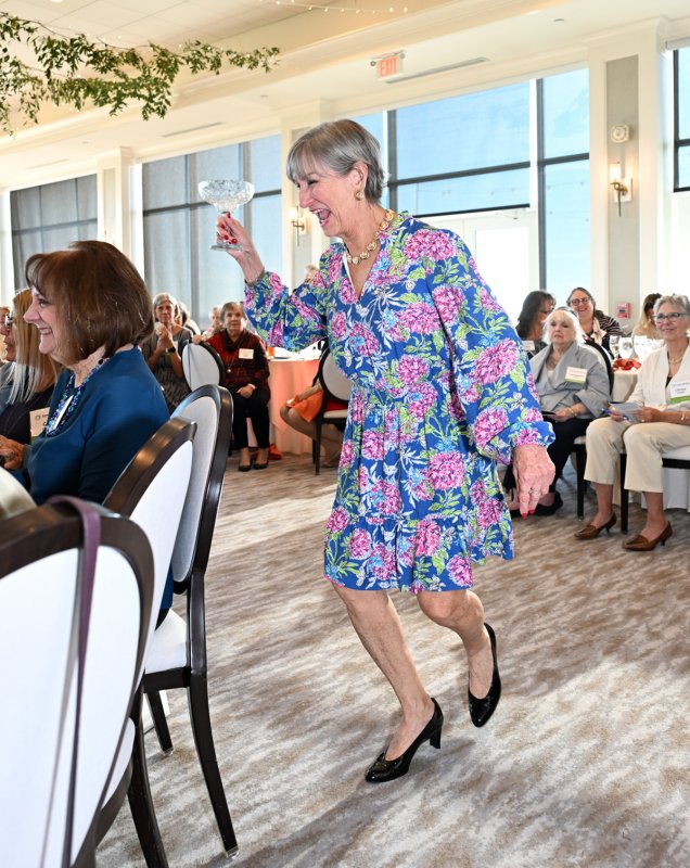 Jan Kliger is playful in a vibrant dress from Pink Leopard.
