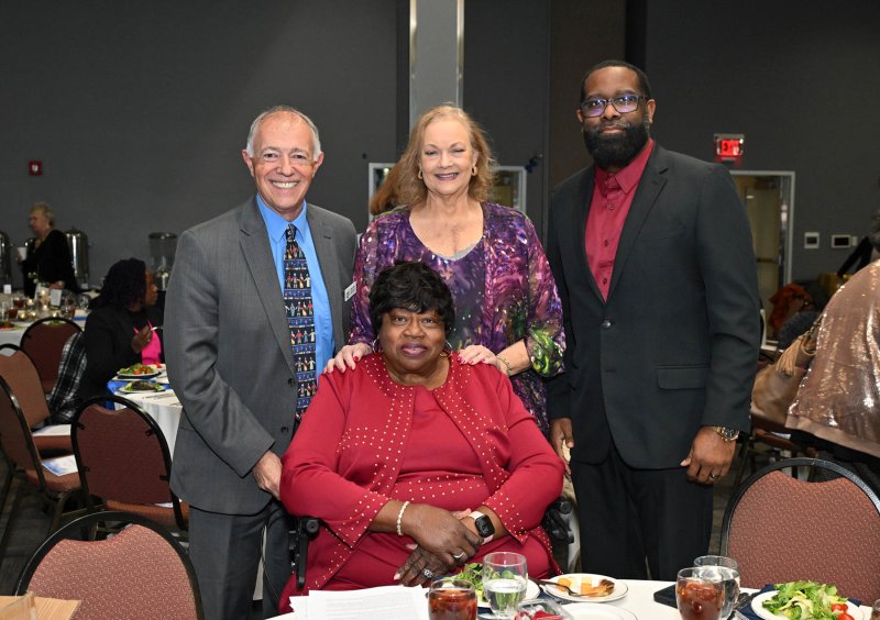 Posing with Bernice Edwards are (l-r) Marty Rendon, Gail Launay and the Rev. Jamaal Bivins.