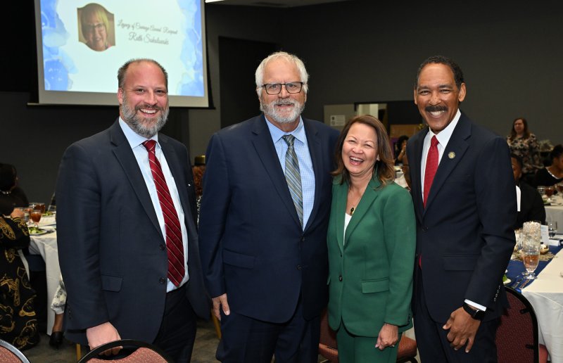 Enjoying the event are (l-r) Matt Heckles, Paul Calistro, and Maria and Nadab Bynum.