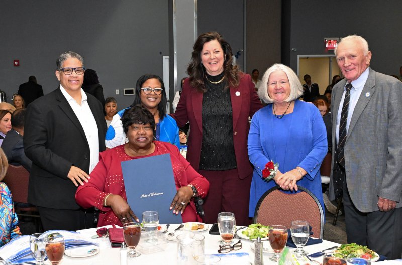 First State Community Action Agency Executive Director Bernice Edwards receives tributes during the 60th anniversary celebration. Shown are (l-r) Rep. Kerri Evelyn Harris, D-Dover; Edwards; Rep. Alona Berry, D-Milton; Rep. Valerie Jones Giltner, R-Georgetown; FSCAA Board President Anne Farley; and Sen. Dave Wilson, R-Lincoln. DAN COOK PHOTOS