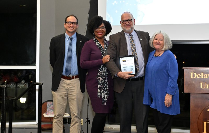 FSCAA Board President Anne Farley presents the Community Partner Award to the Delaware Community Foundation. Shown representing the Delaware Community Foundation are (l-r) Mike DiPaolo, Chanta Wilkinson, Stuart Comstock-Gay and Farley.
