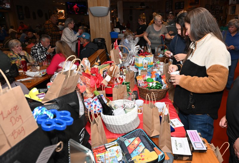 The raffle table brought donations to the cause.