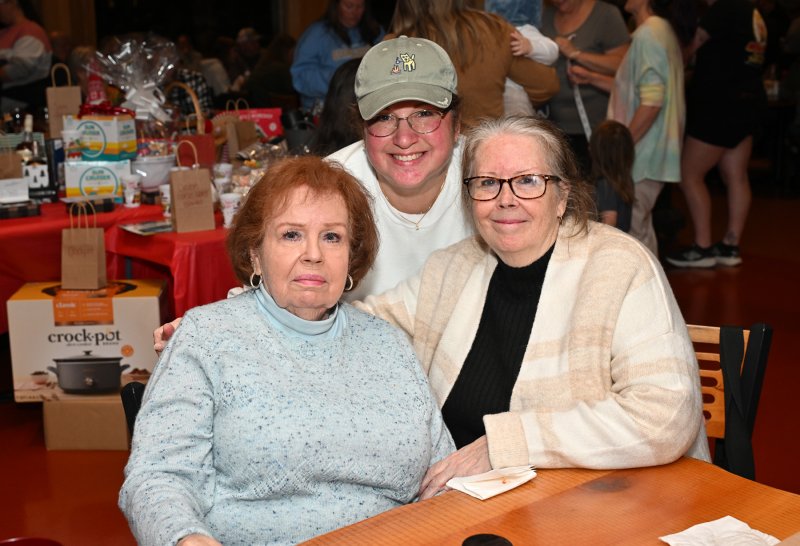 Having a minute are (l-r) Aunt Zsa Zsa Richardson, niece Kelly Nantz and mom MaryLou Elrod.