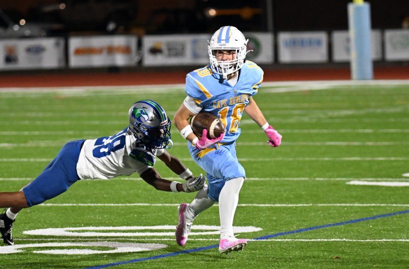 Junior wide receiver Aidan Lehmuth runs out of the tackle attempt by St. Georges defensive back Ayden Davis.