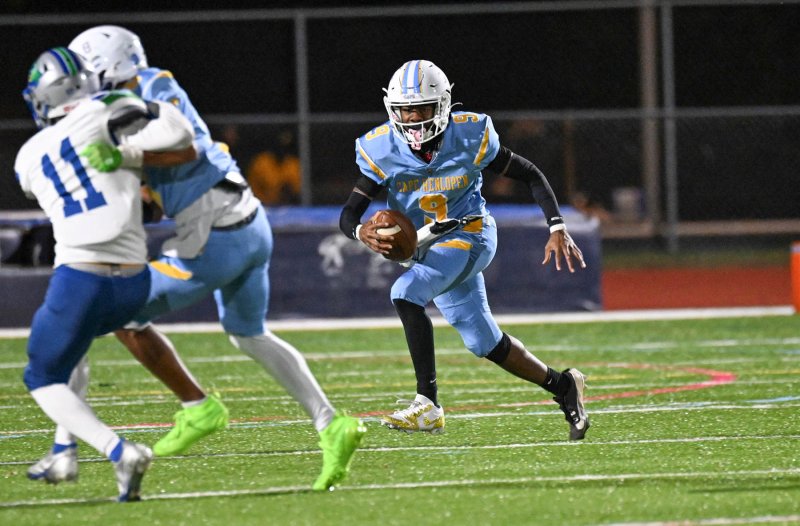 Senior Navin Duffy runs back a kick for a long gain.