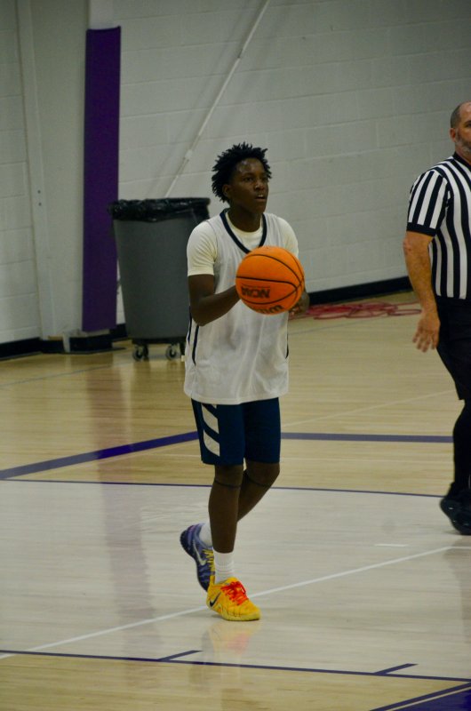 Sophomore Farmar Amisial hollers out directives after receiving the in-bound.