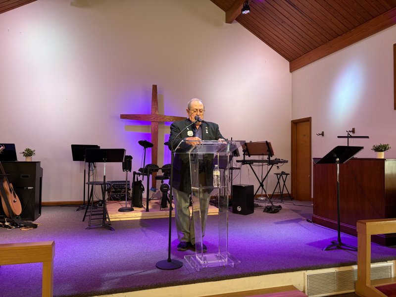 Charlie Taylor of the Harrington Lions Club gives the opening prayer.